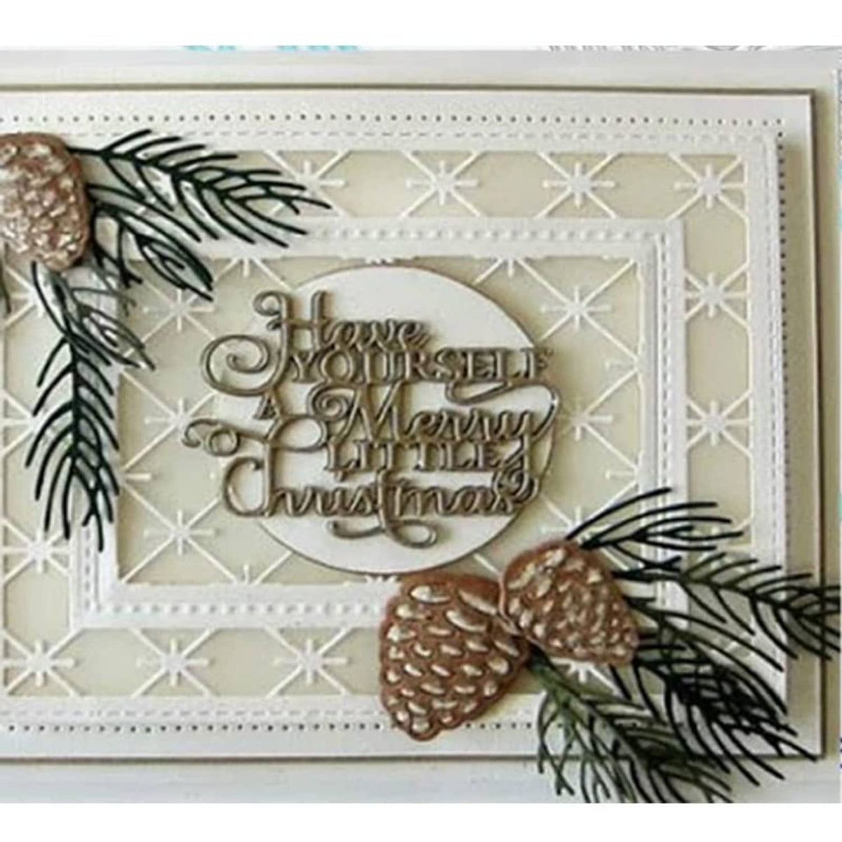 Christmas greeting card with silver metal pine cone and leaf die cuts