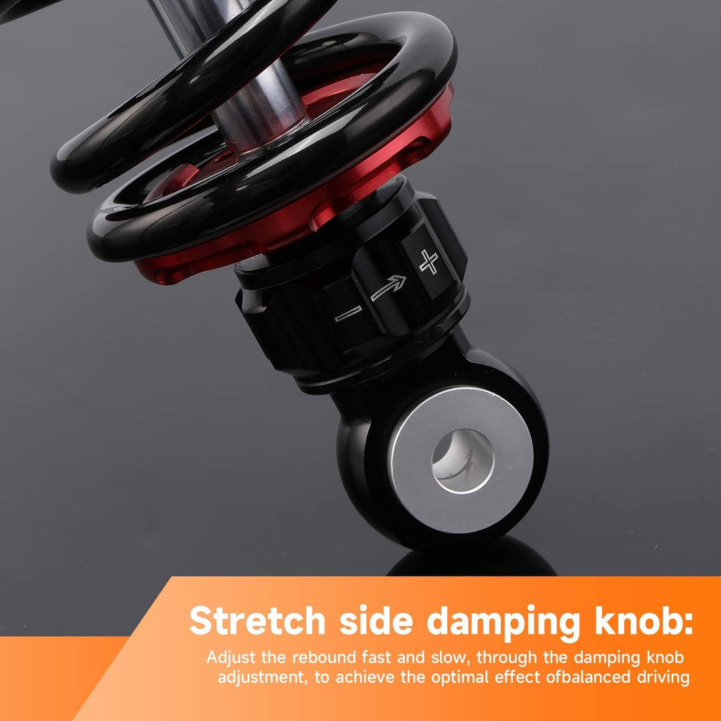 Shock absorber with red coil spring, black damping knob, and round mounting eye