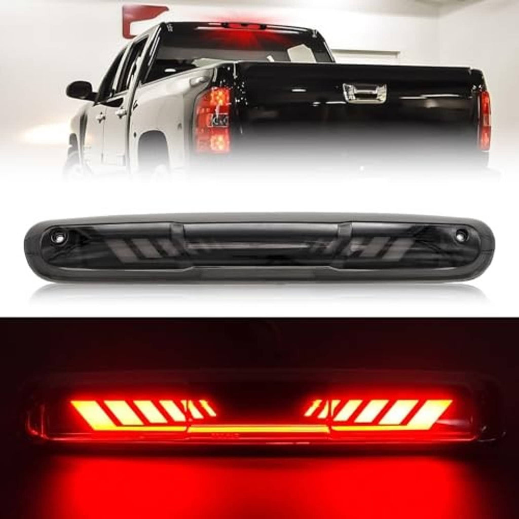 Third brake light with black casing and illuminated red LED strip, close-up
