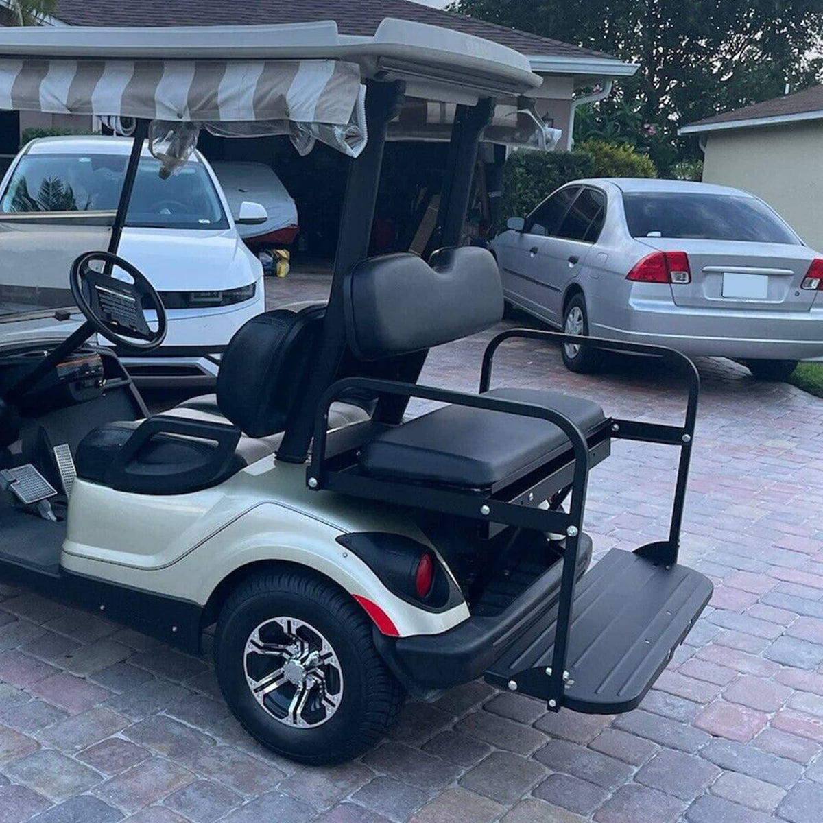 Rear seat kit on white golf cart with black frame and dark gray padded cushions