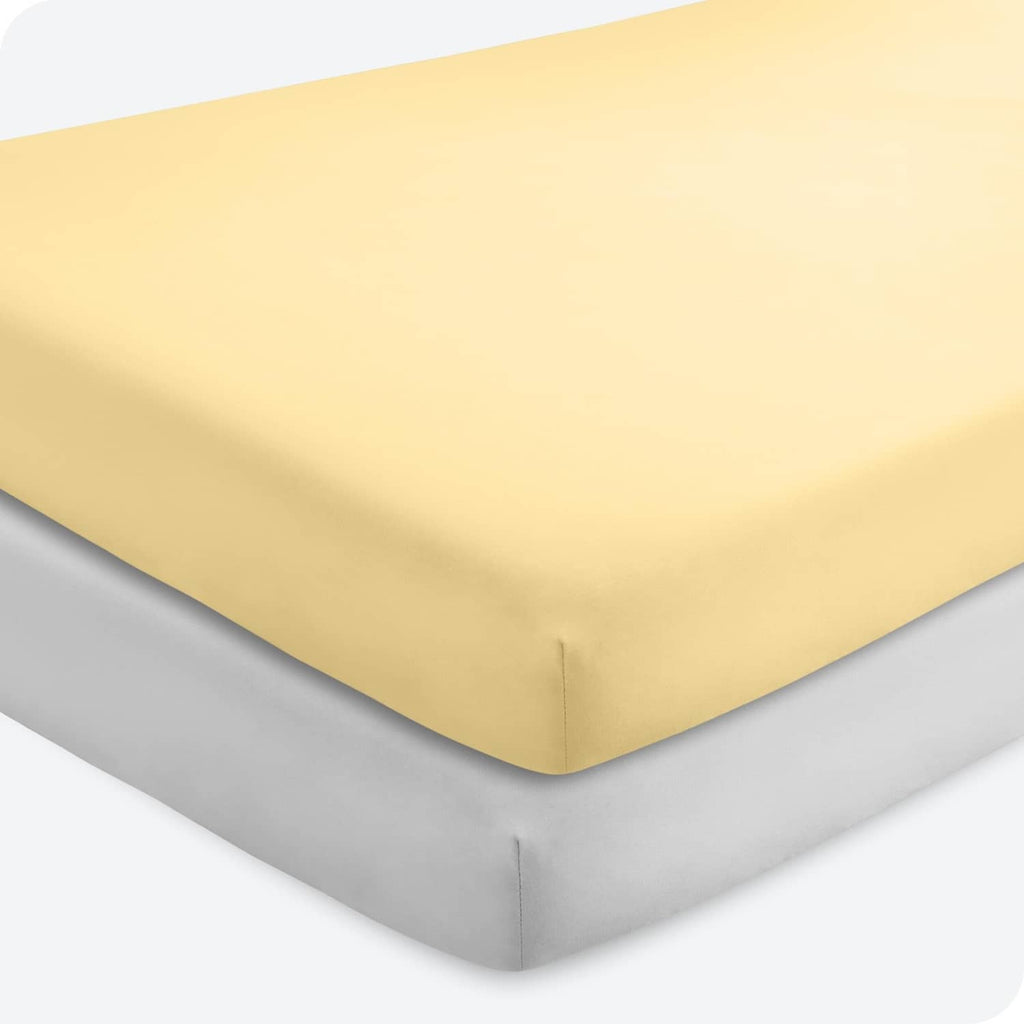 Crib fitted sheet, warm yellow microfiber with fitted elastic corners