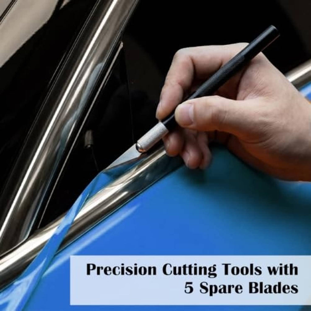 Precision cutting tool with spare blade trimming window tint film on a car