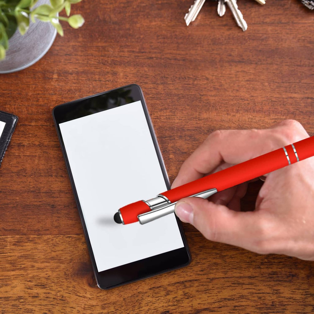 Red pen with stylus tip held over a tablet screen, silver grip