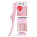 Pink detangling hairbrush with two-tier flexible bristles, straight to regular size
