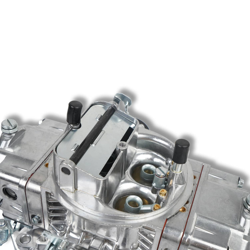 4-barrel carburetor top with black choke caps and two round intake ports