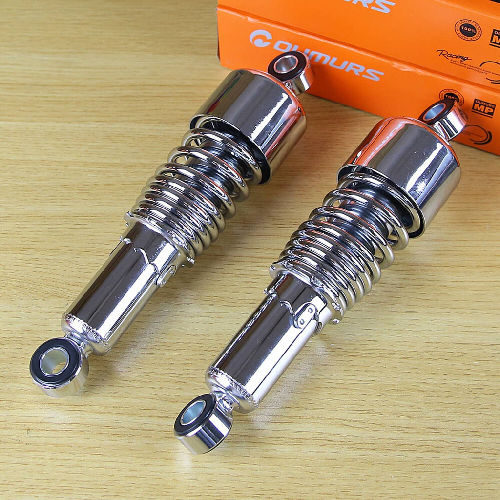 Chrome rear shock absorbers pair with coiled springs and black mounting eyes