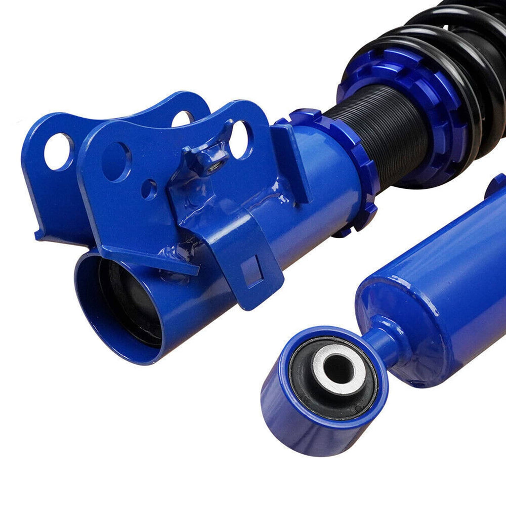 Close-up of blue coilover strut assembly with black spring and metal mounting bracket