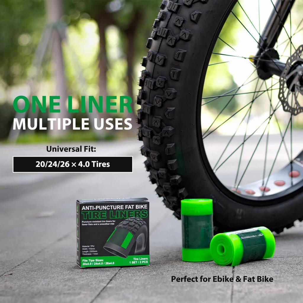 Green TPU fat bike tire liners near a mounted fat tire wheel.