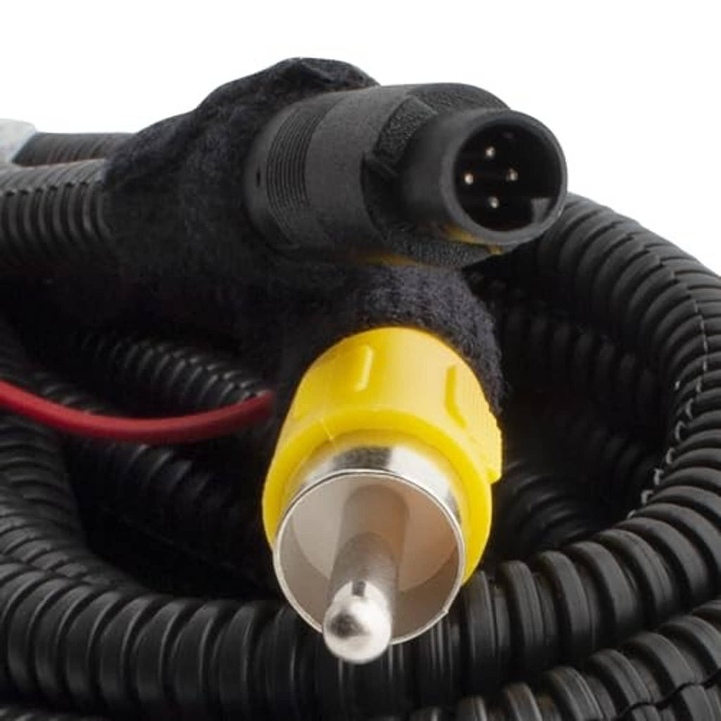 Close-up of wiring connector with yellow plug and metal pin on black cable