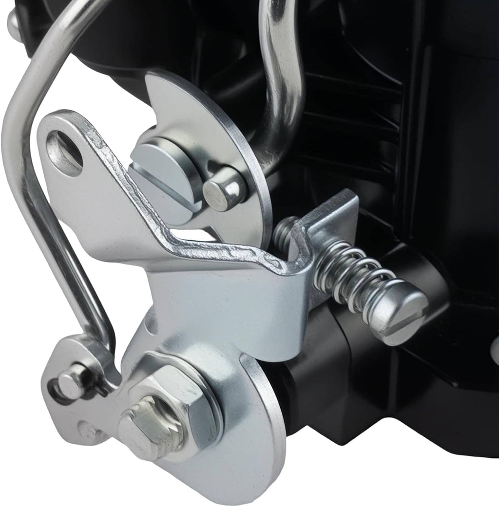 Marine carburetor linkage and spring assembly on black housing with silver hardware