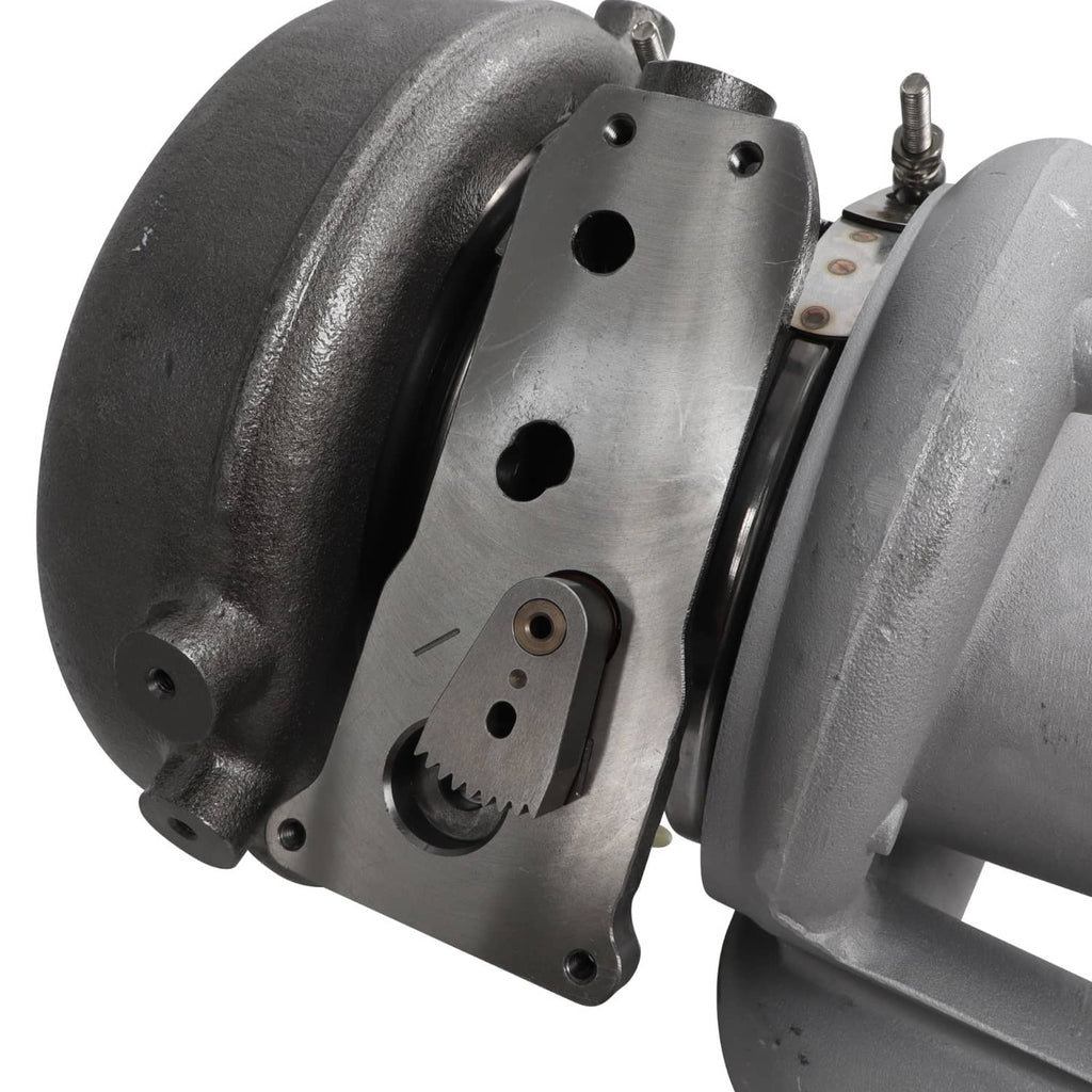 Diesel turbocharger with side cover plate, gear segment, and actuator arm