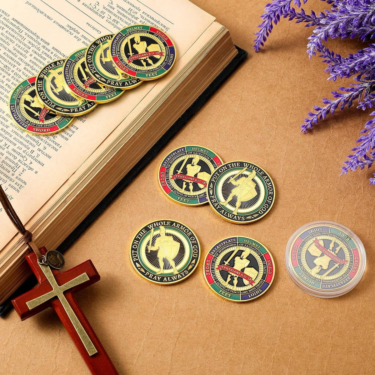 Gold-tone prayer coins with helmet emblem on cards, including several round coins