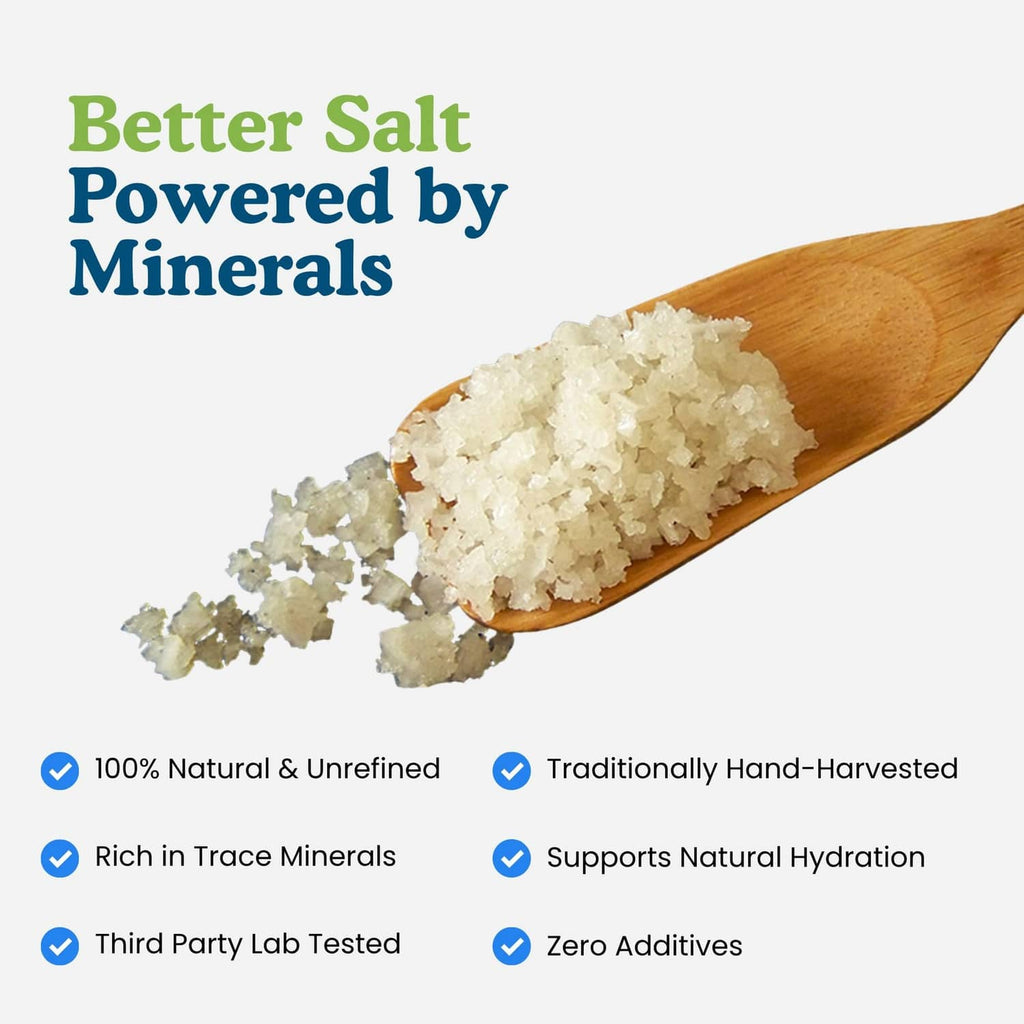 Coarse grey salt crystals on a wooden spoon