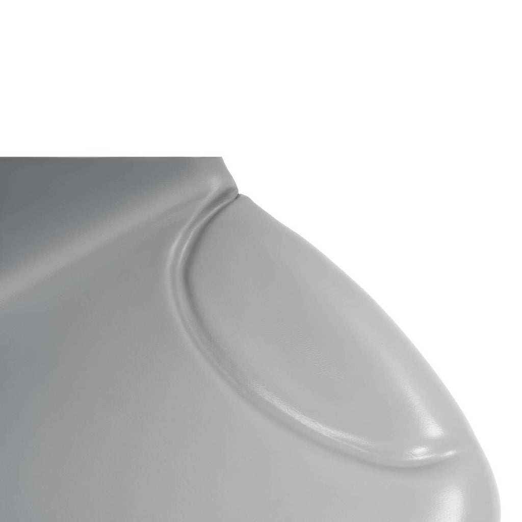 Light gray tractor seat side bolster curve close-up