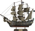 Wooden pirate ship model with dark hull, olive sails, and “Black Pearl” nameplate on stand