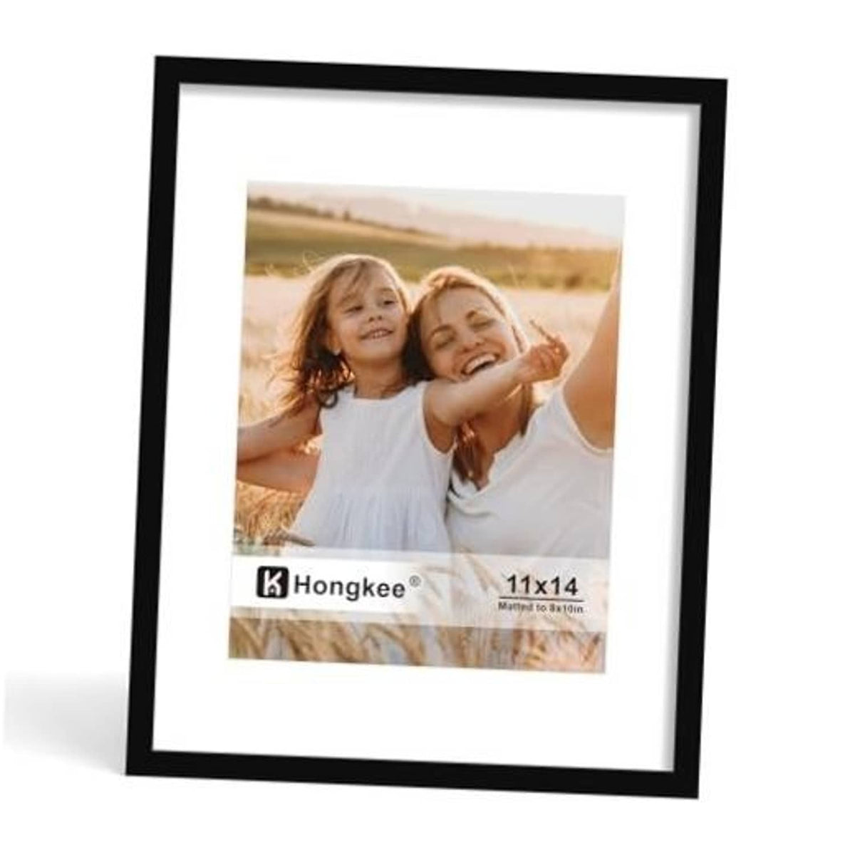 Black solid wood picture frame with real glass, holding a portrait photo