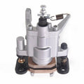 Rear brake caliper with pads, silver metal body and brown friction pads