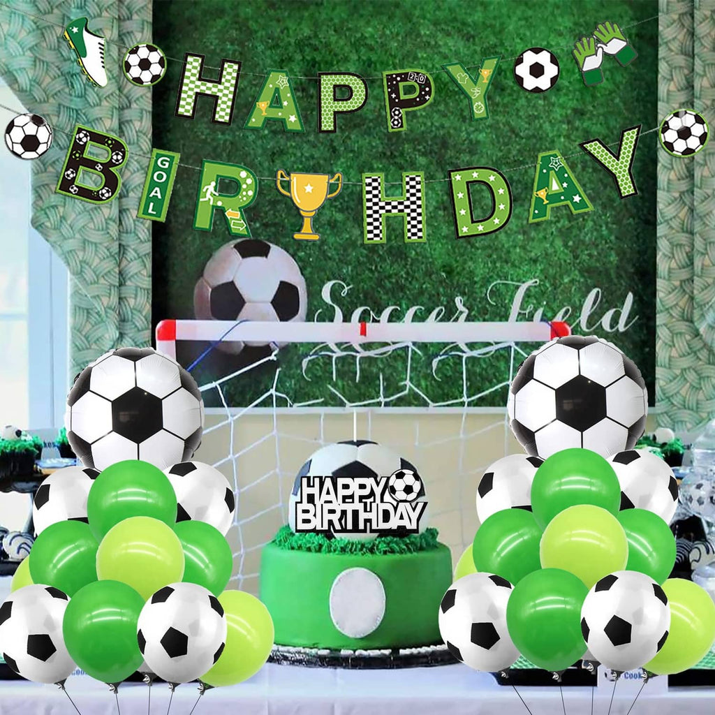 Soccer birthday banner on green turf-like background, surrounded by green and black balloons