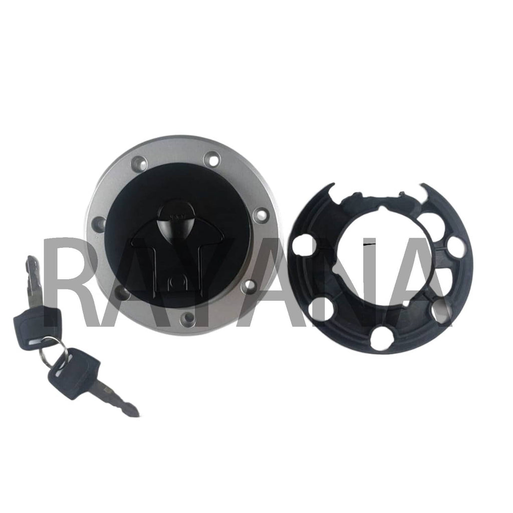 Fuel tank gas cap kit with keys, lock cap, and round mounting ring, side view.