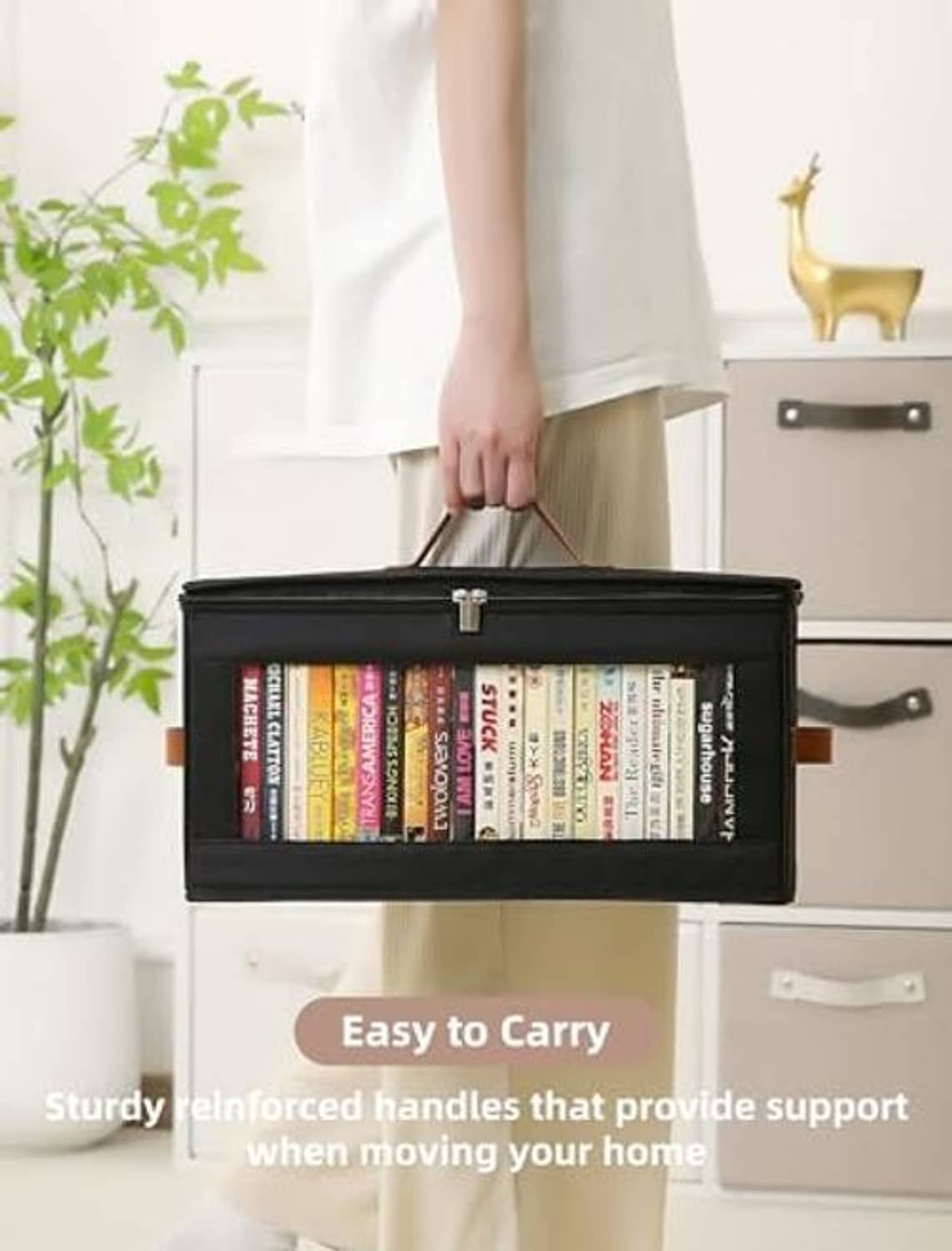 Black DVD storage box with zip lid and reinforced handles, DVDs visible inside