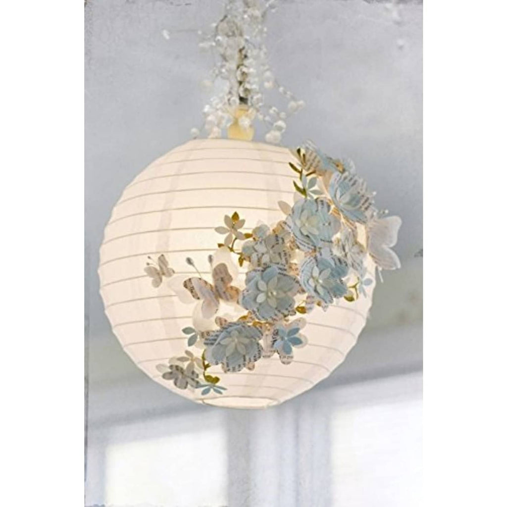 White round paper hanging lantern with blue flower embellishments