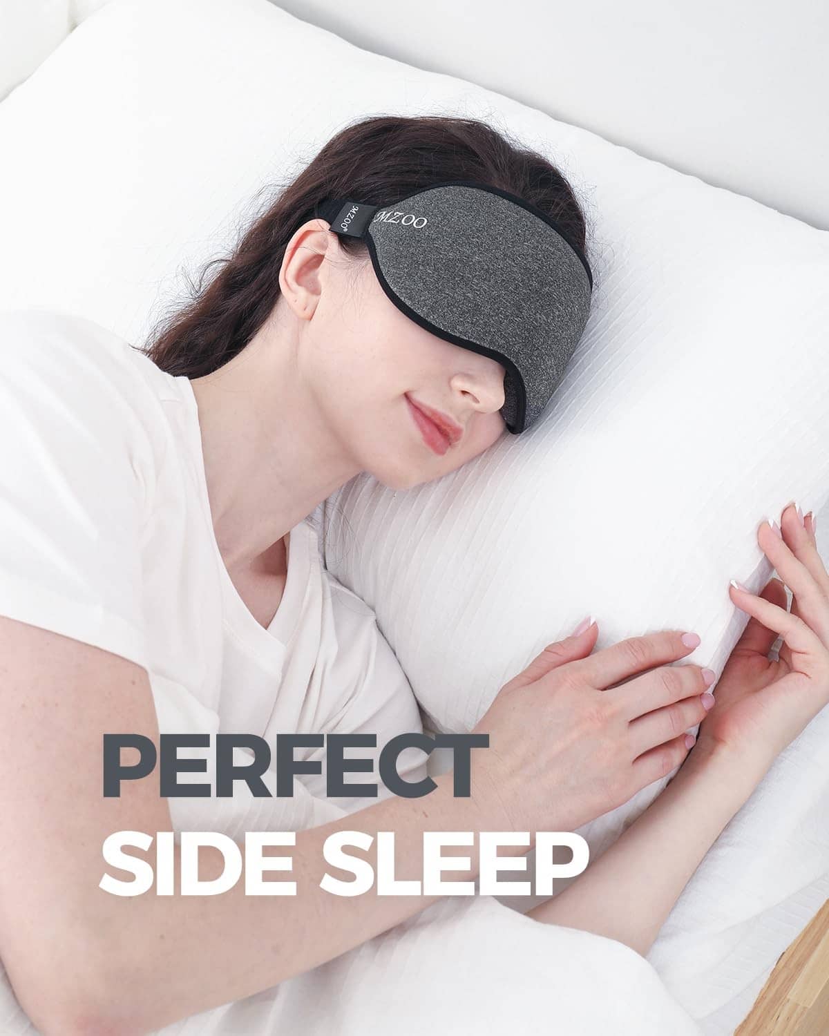 Soft dark gray sleep mask with black edge, contoured eye shape on face