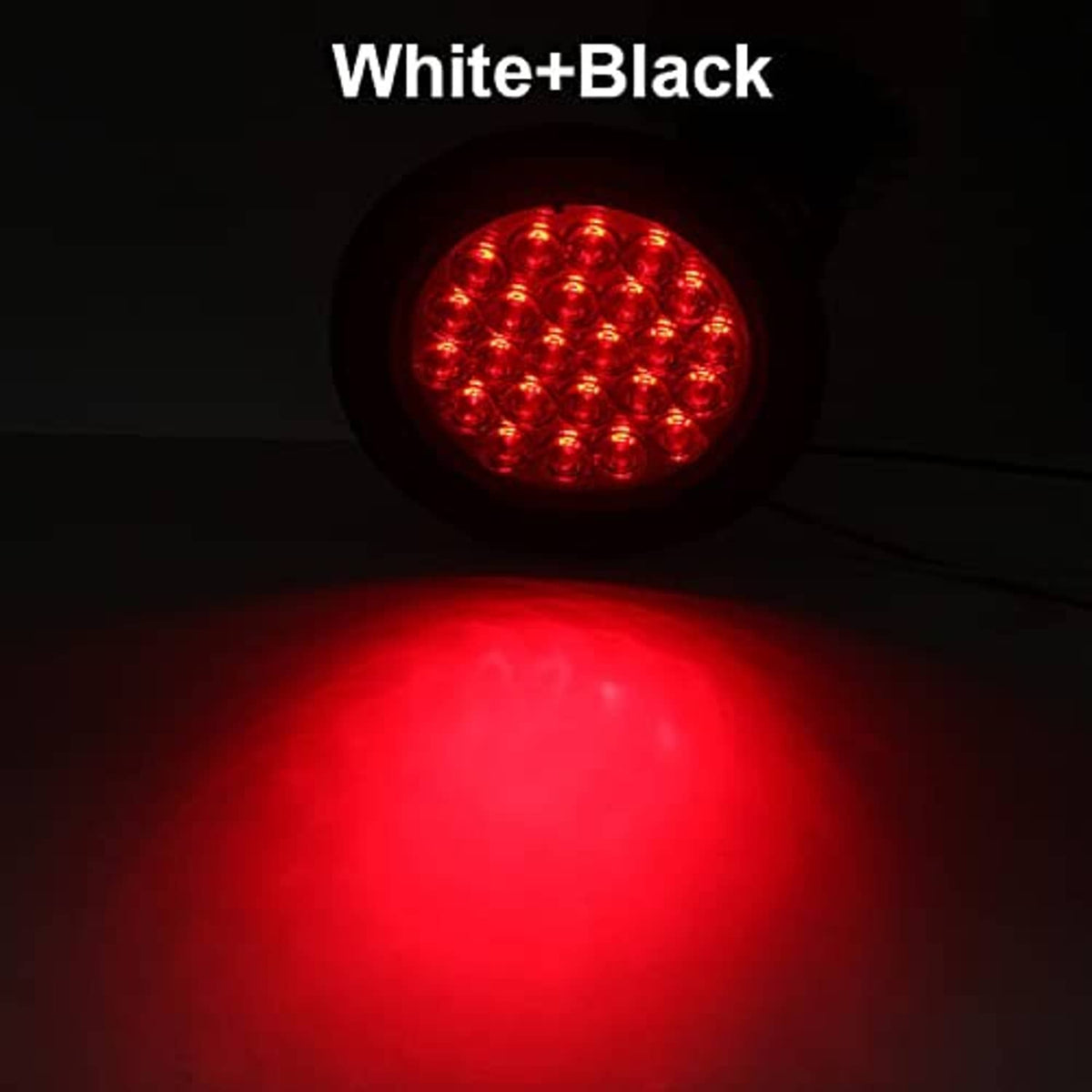 Illuminated red round LED trailer tail light showing multiple LED dots, black housing