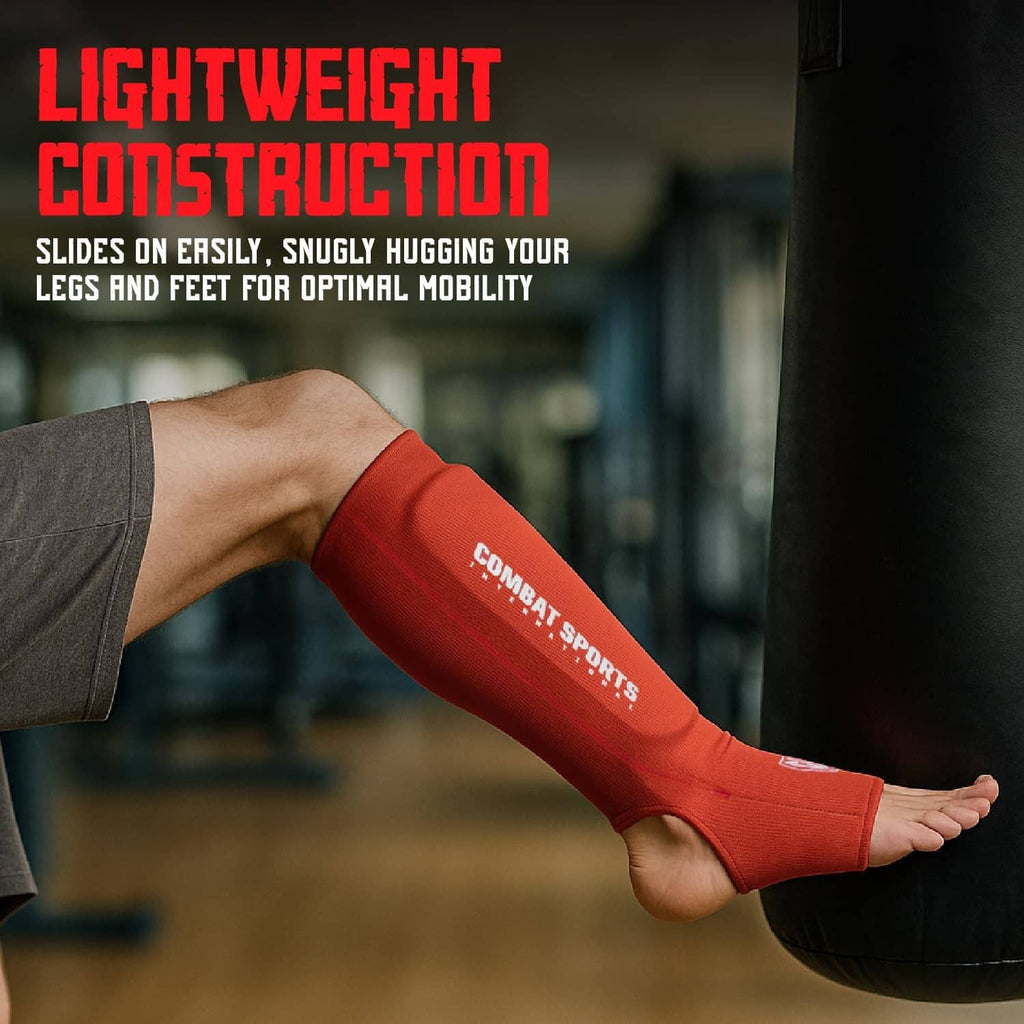 Red lightweight padded shin and instep guards with brand print