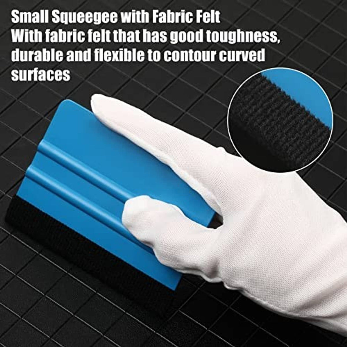 Blue vinyl squeegee with black felt edge, shown with a white-gloved hand