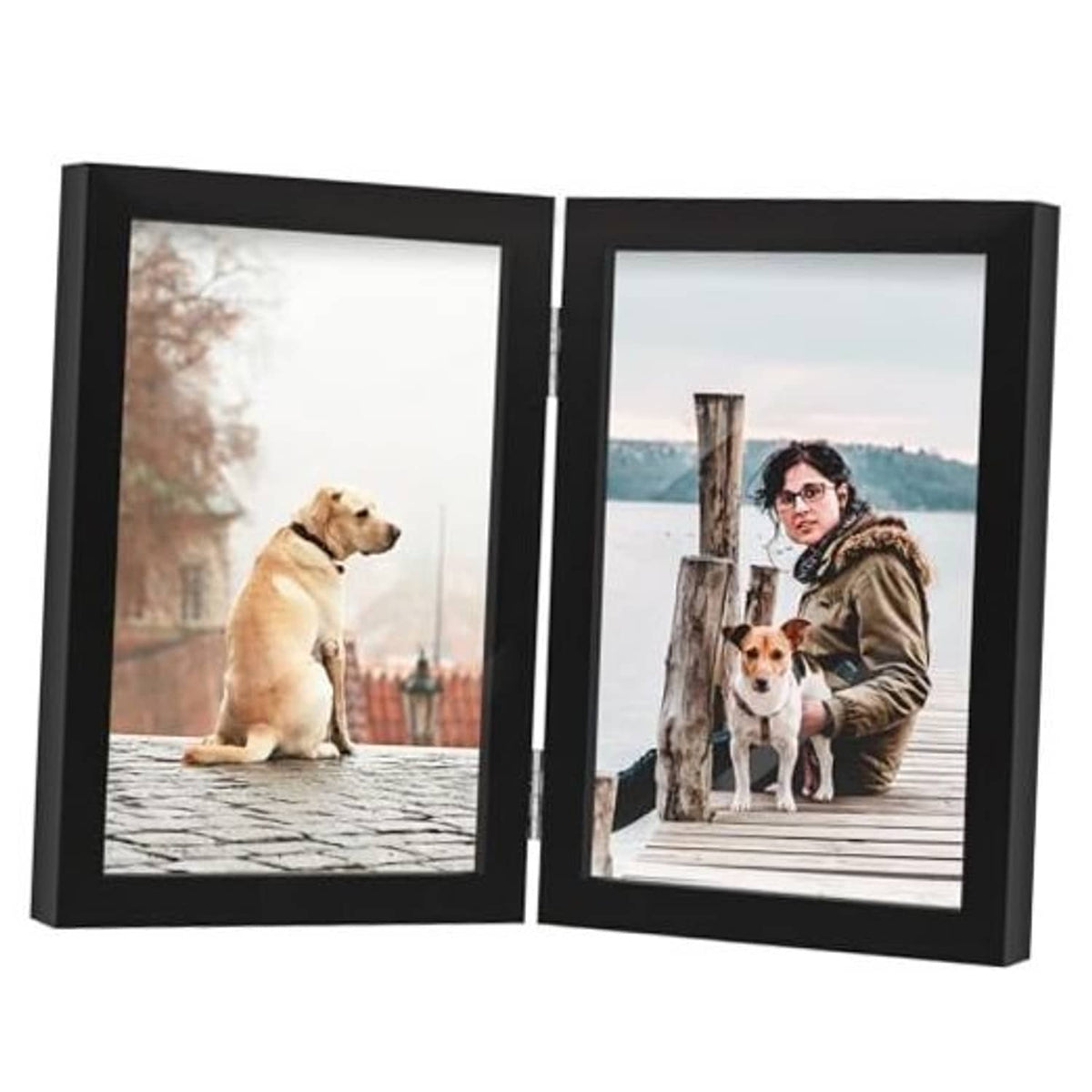 Black double hinged wooden photo frame with clear glass, open, displaying two photos