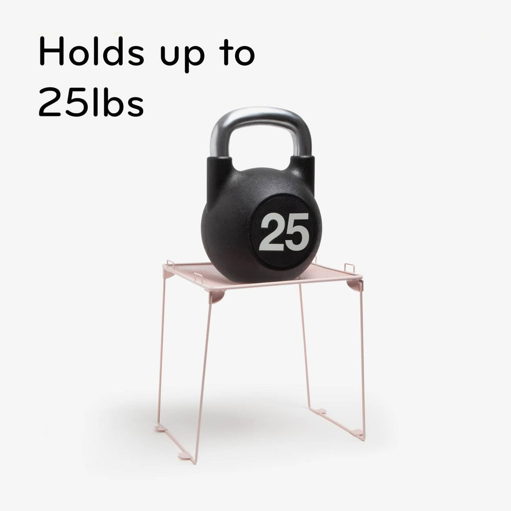 Magnetic holder rated to hold up to 25 lbs weight on a small display stand