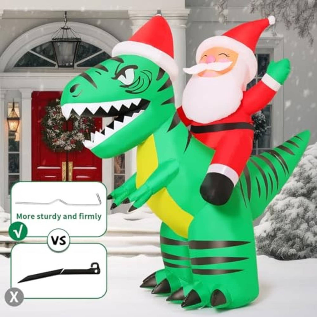 Inflatable Santa riding green crocodile on porch steps with snow backdrop