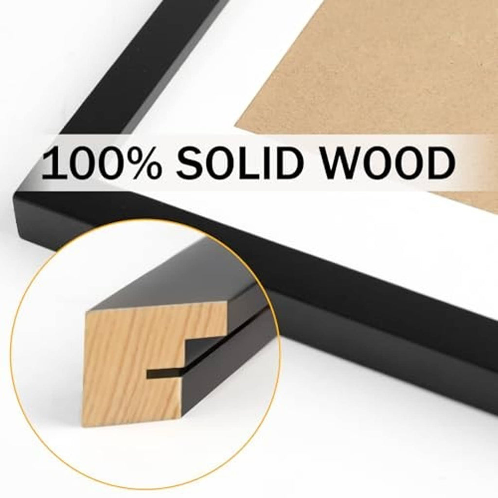 Solid wood picture frame corner with black outer edge and visible wood side