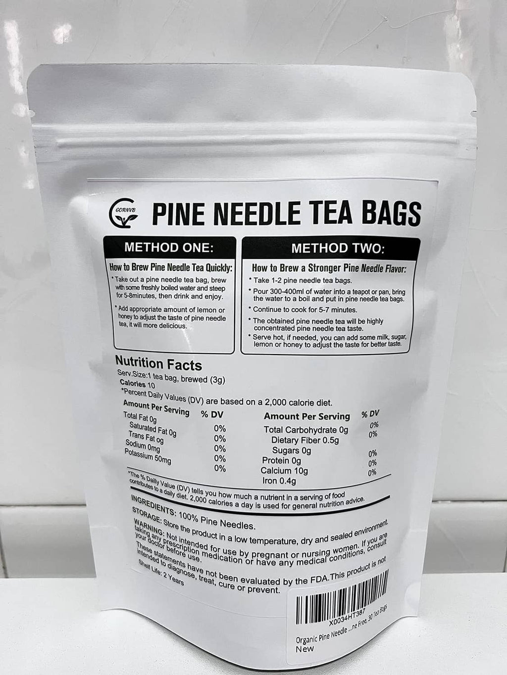 Back of pine needle tea bags pouch with nutrition facts and ingredient label