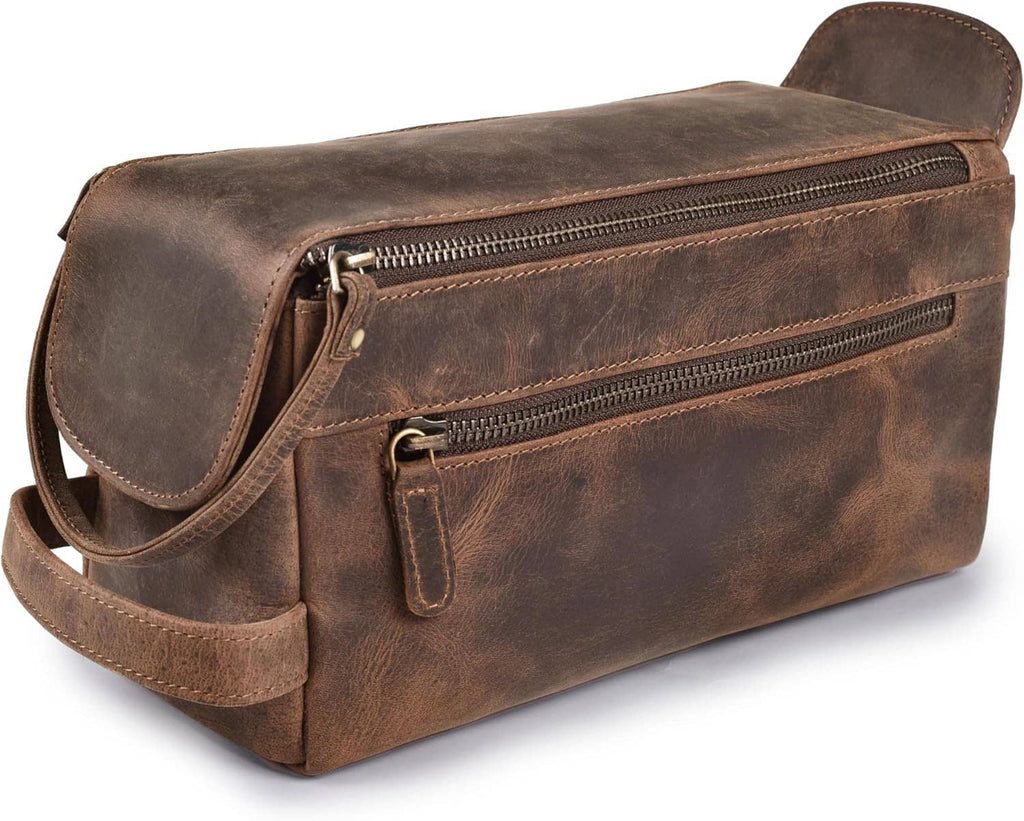 Brown full-grain leather toiletry bag with front zipper pocket and adjustable side strap