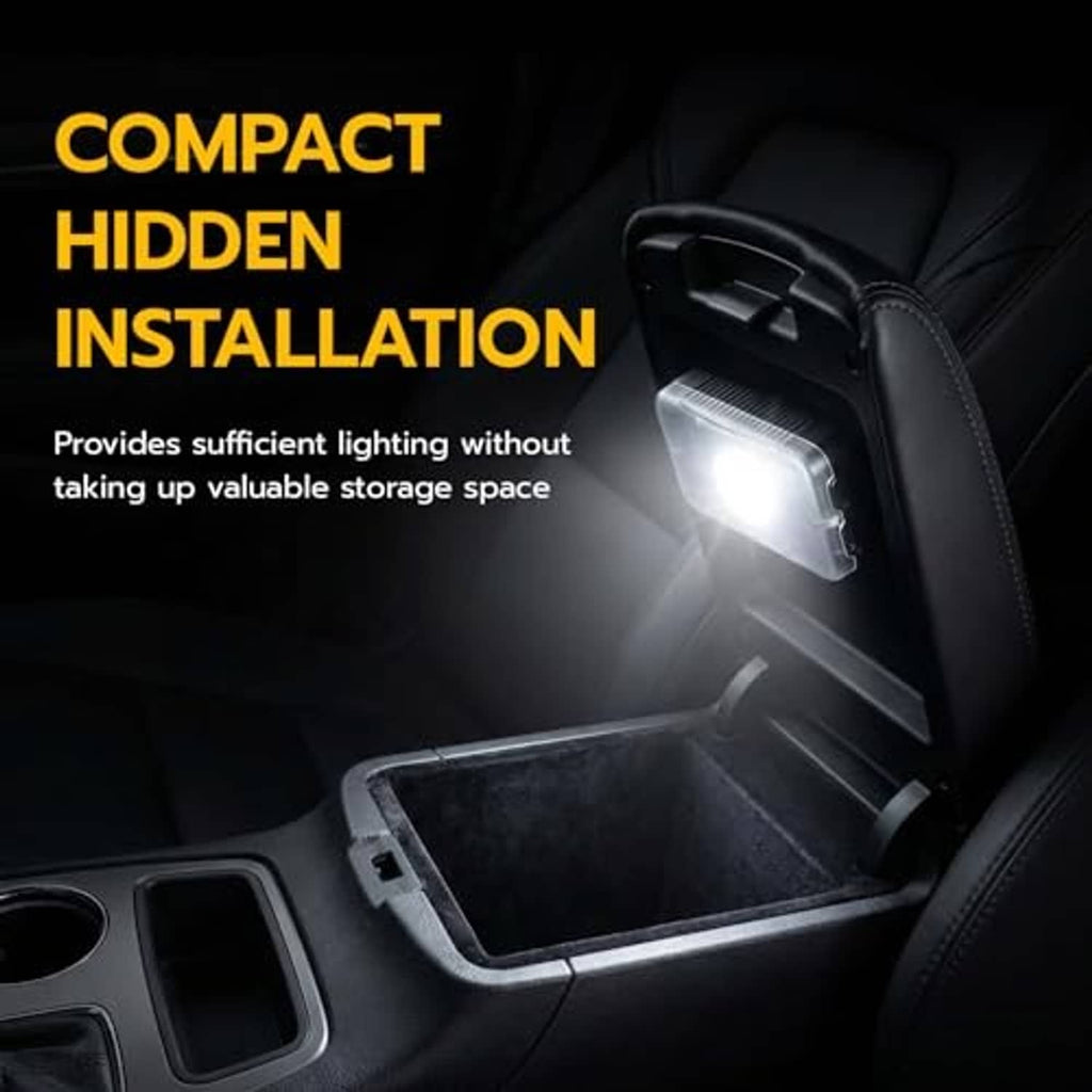Black compact LED sensor light mounted in car interior with bright light