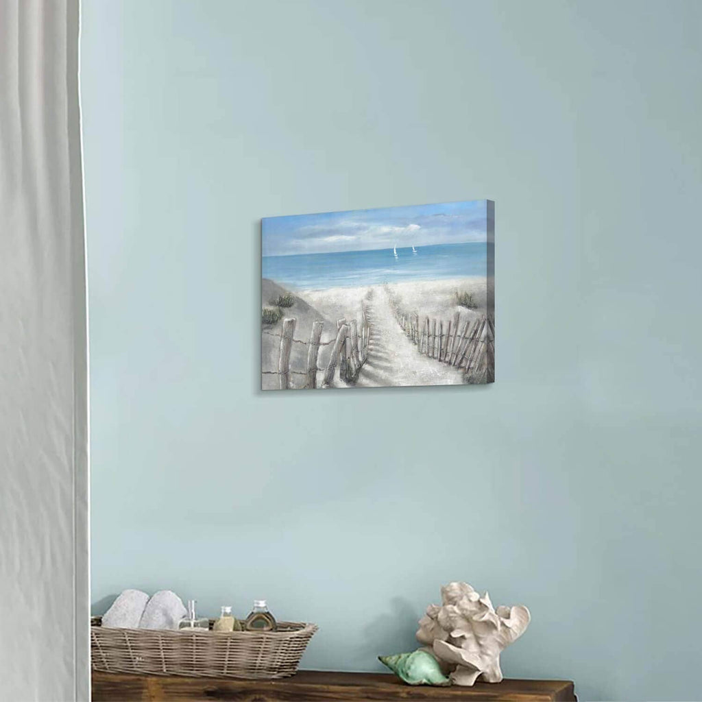 Coastal ocean canvas print with blue sky, sandy beach path, and sailboats