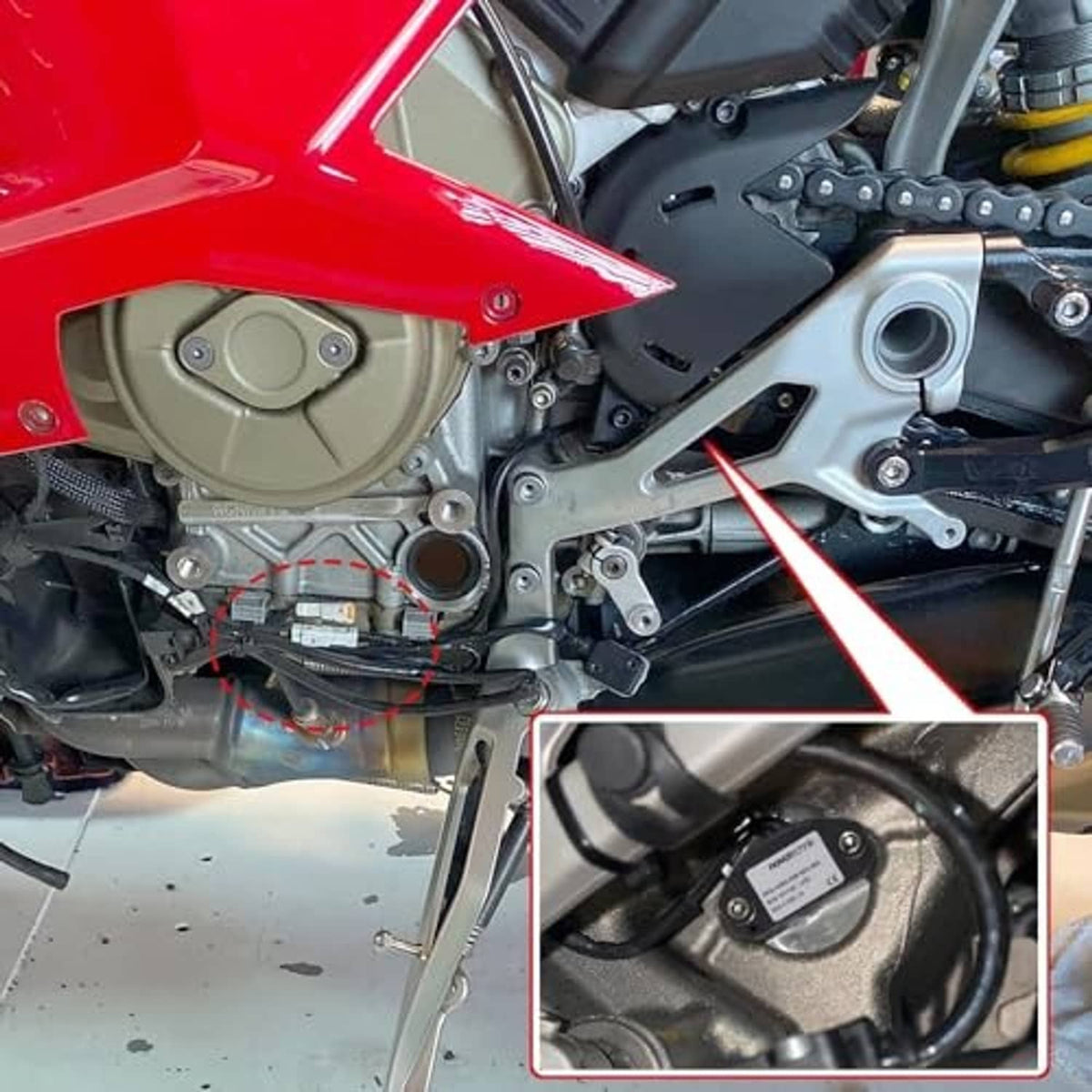 Installed motorcycle gearbox position sensor on engine area with wiring connector