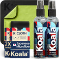 Koala lens cleaner spray kit with two clear bottles, black sprayers, and microfiber cloth pack.