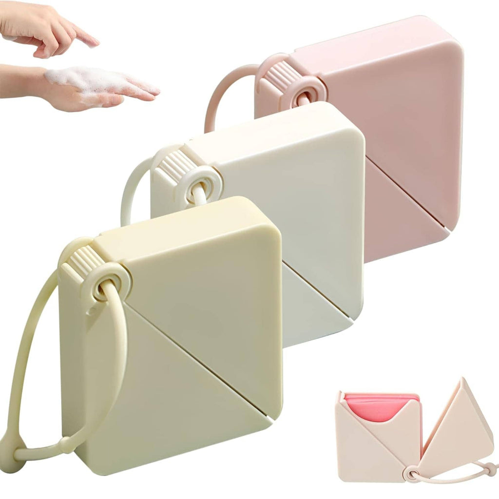 Cream, light green, and pink travel soap sheet dispenser boxes with hanging lanyards