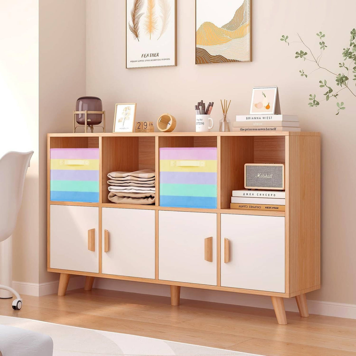 Rainbow fabric storage cubes inside a wooden sideboard cabinet with doors