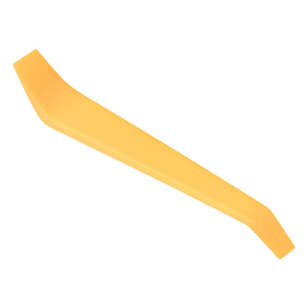 Amber/orange plastic strip accessory for power window switch installation.