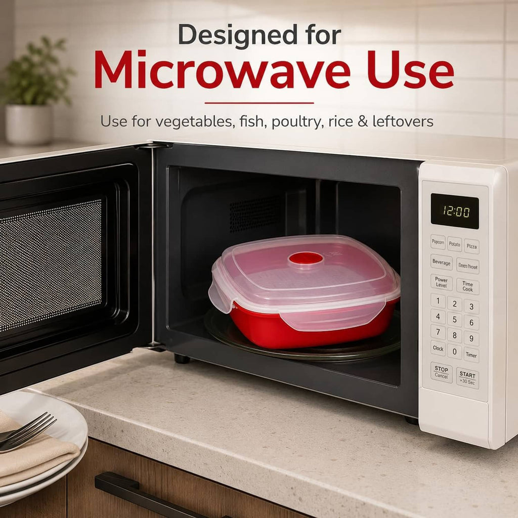 Vented microwave steamer placed in microwave oven with clear lid and red base