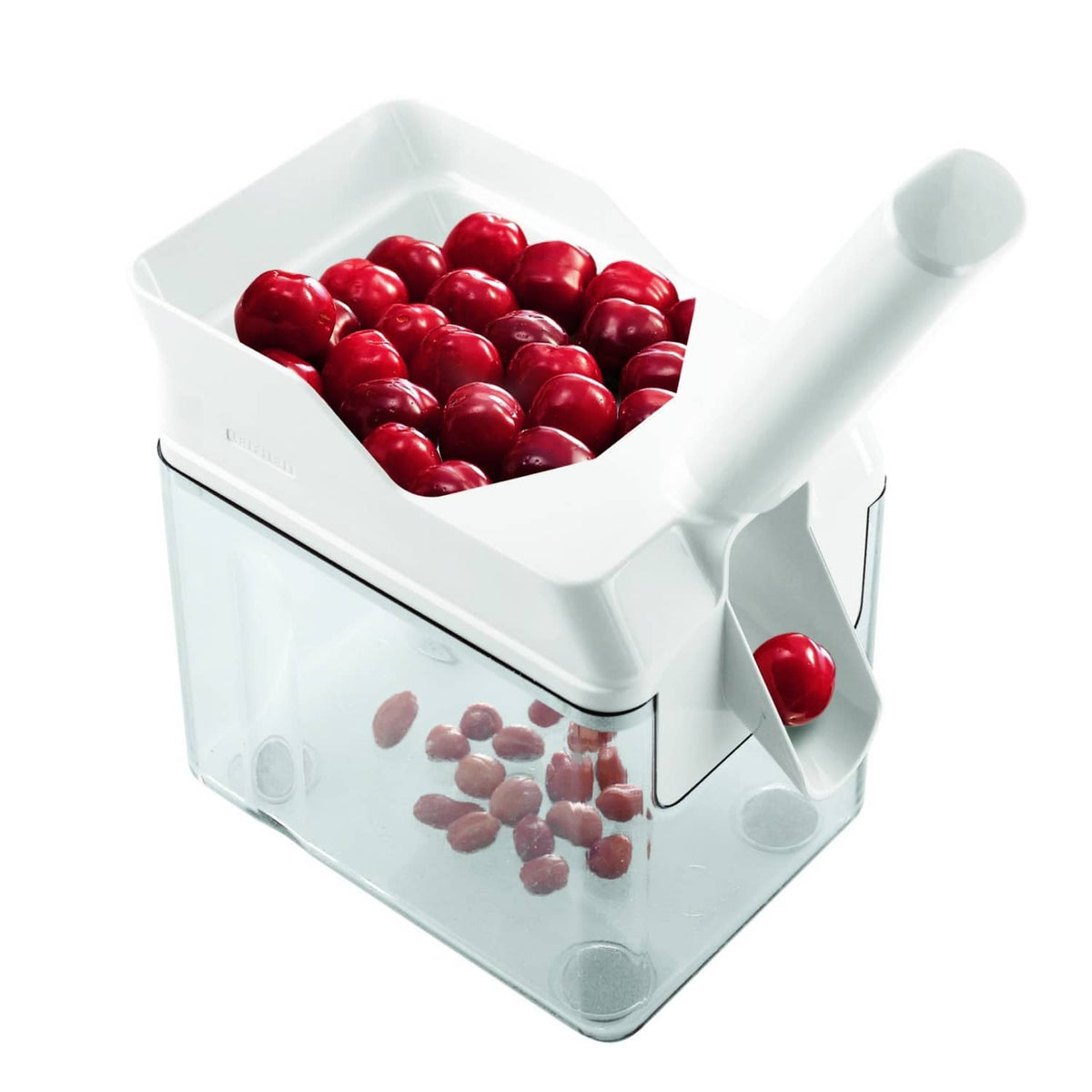 White Leifheit cherry stone remover with red cherries in the top hopper