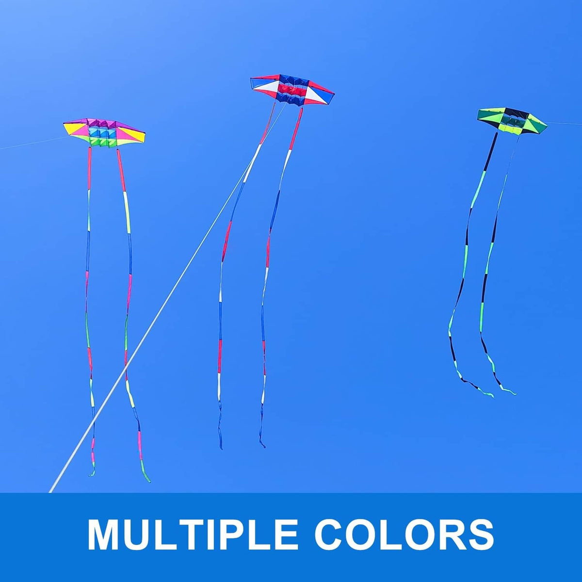 Set of colorful diamond beach kites with long tails, three kites in view