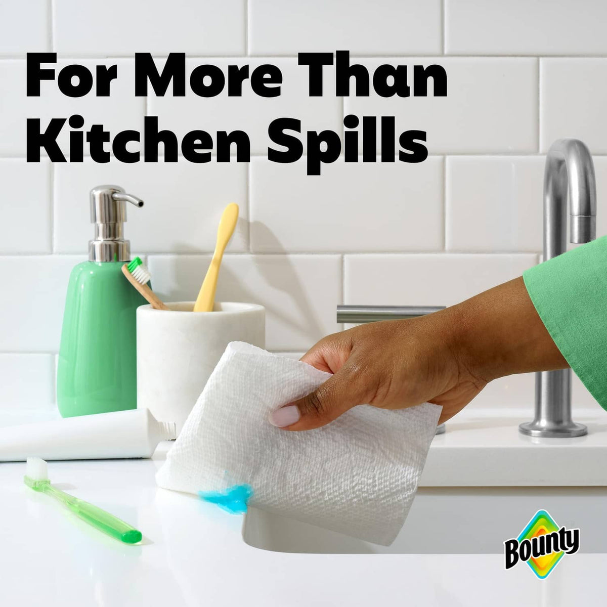 White paper towel sheet in hand for wiping messes, embossed absorbent texture