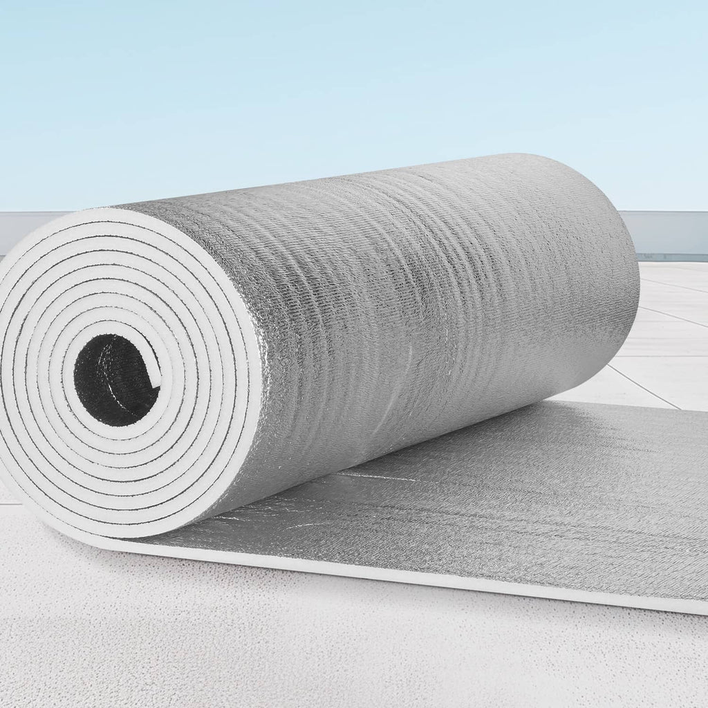 Silver radiant barrier insulation roll on a flat sheet, reflective foil texture
