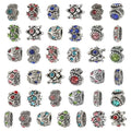 Assorted antique silver rhinestone charm beads with red, blue, green, and black stones