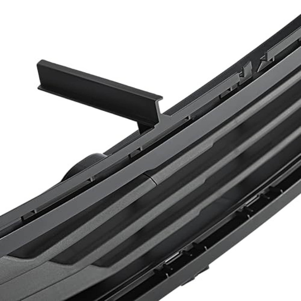 Close-up of black grille bar edges and cross slat structure