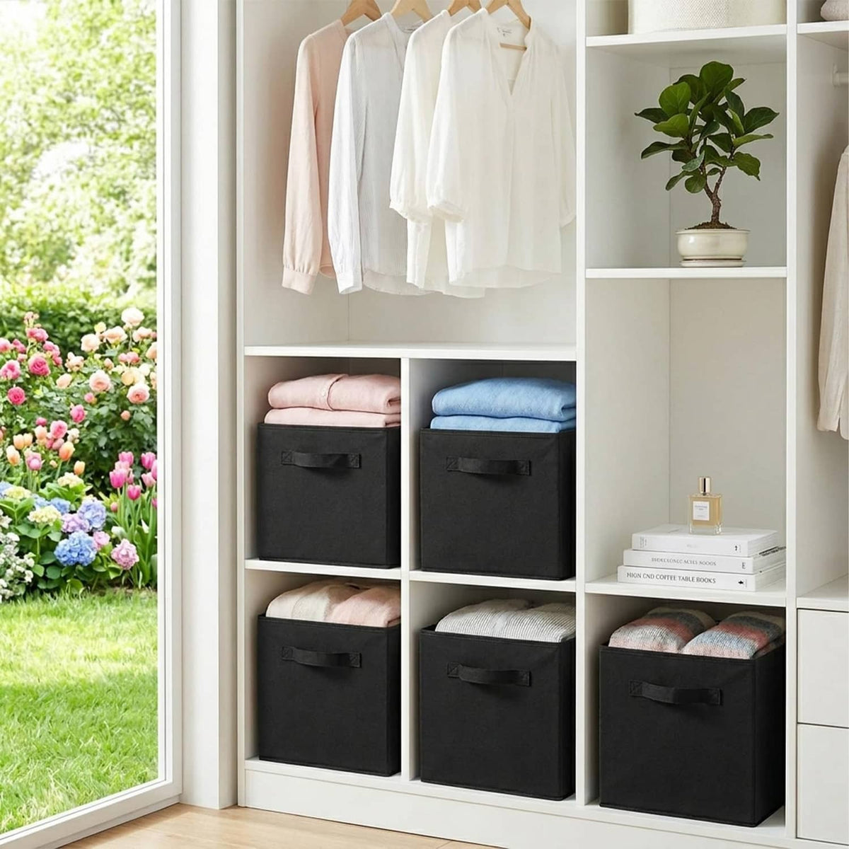 Set of black storage cubes with pull handles on a shelving unit